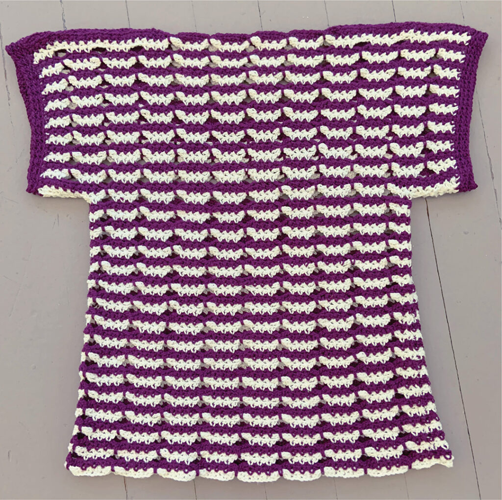Here you can see the Butterfly Stripe Tee as it lays flat.  This pattern from Crochet with Mary Beth is fun, quick, and stylish. Click through to see more pictures and a description on the blog. 