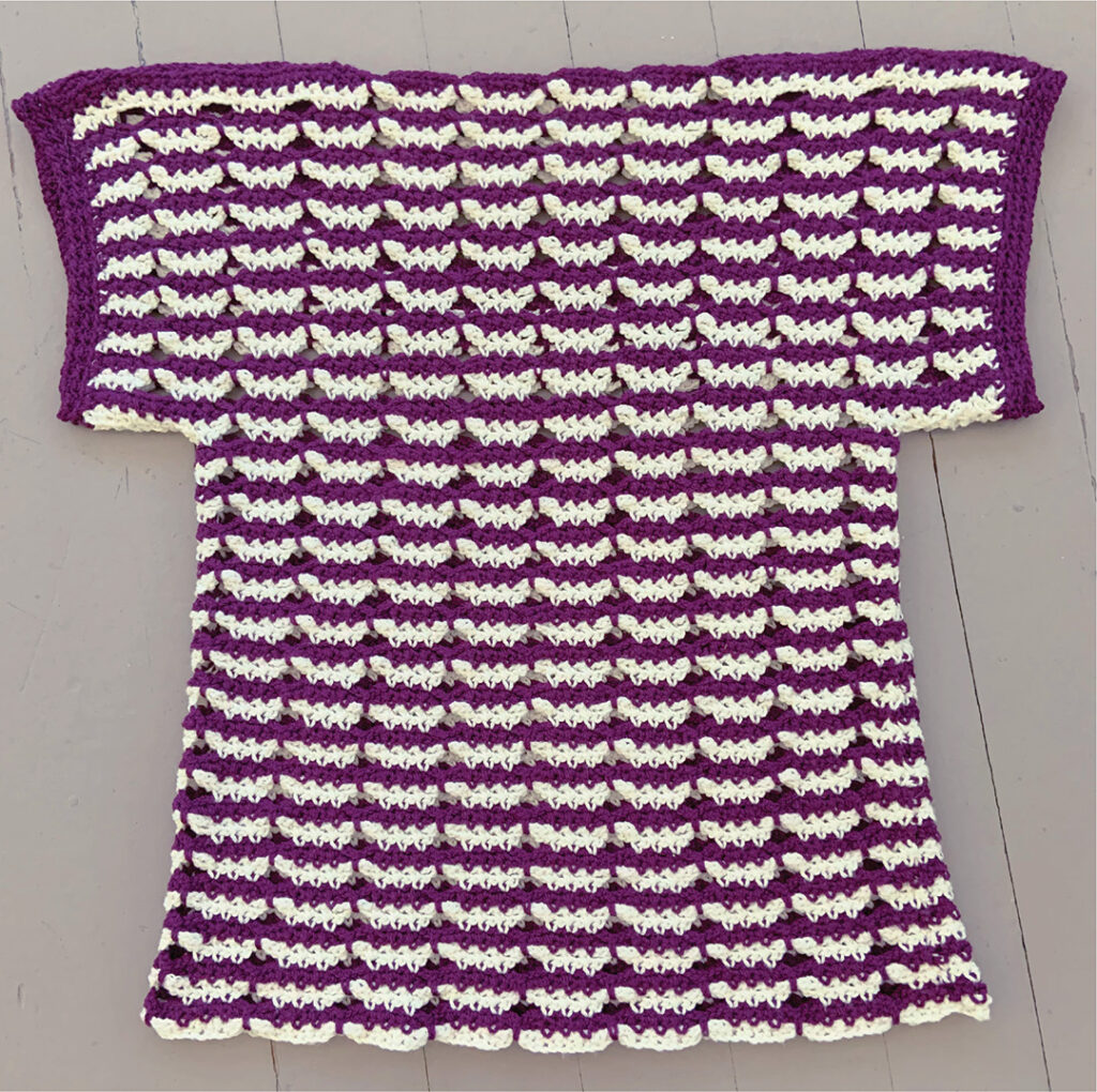Here you can see the Butterfly Stripe Tee as it lays flat. This pattern from Crochet with Mary Beth is fun, quick, and stylish. Click through to see more pictures and a description on the blog.