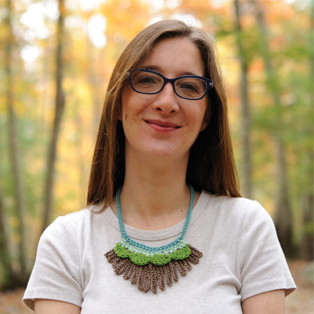 Mary Beth of Crochet with Mary Beth wearing the Loopy Crochet Necklace.  This quick project is a great break from a larger project.