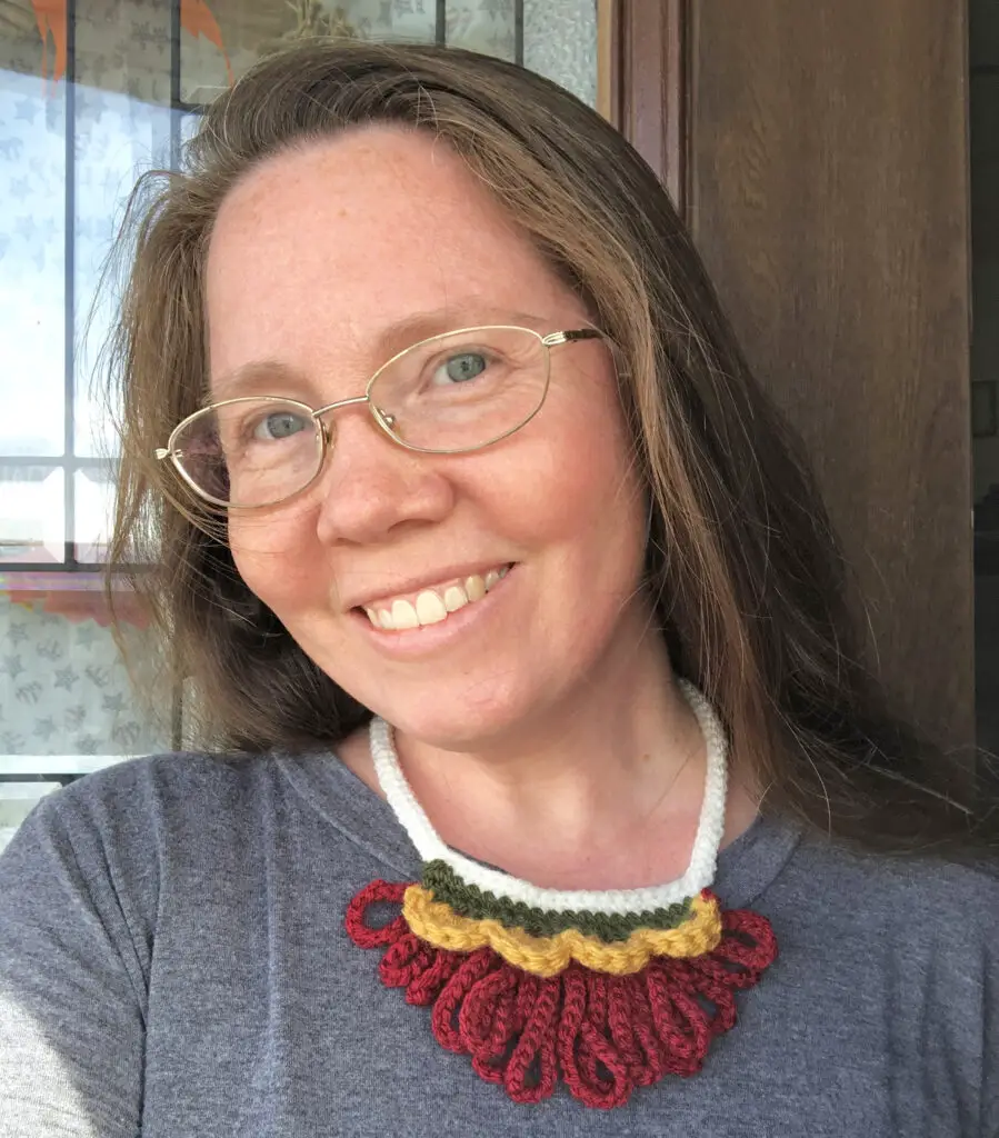 Michelle is cute wearing her autumn inspired crochet jewelry.