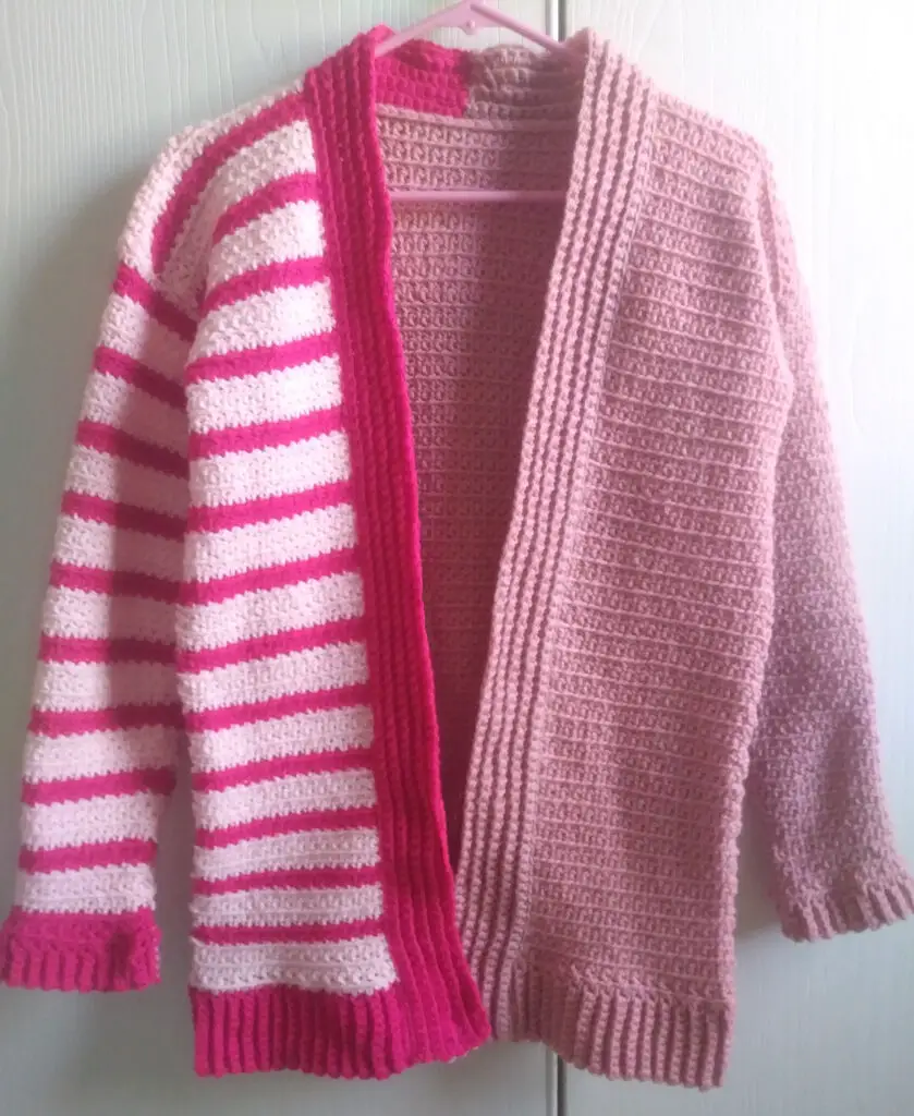 An all pink stripe cardigan.