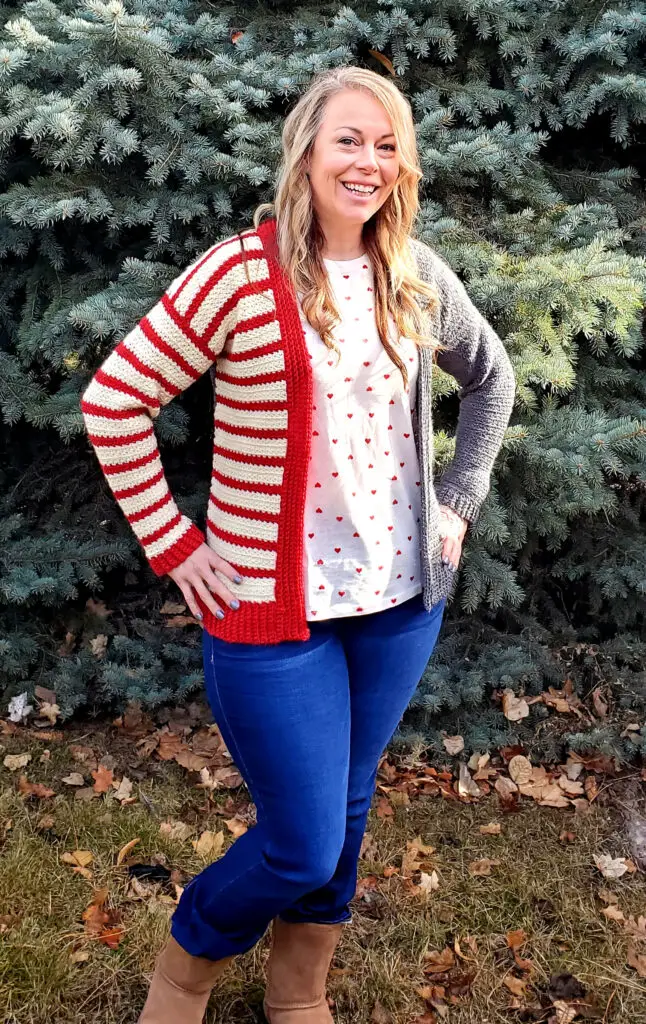 A women modeling the completed crochet cardigan pattern.