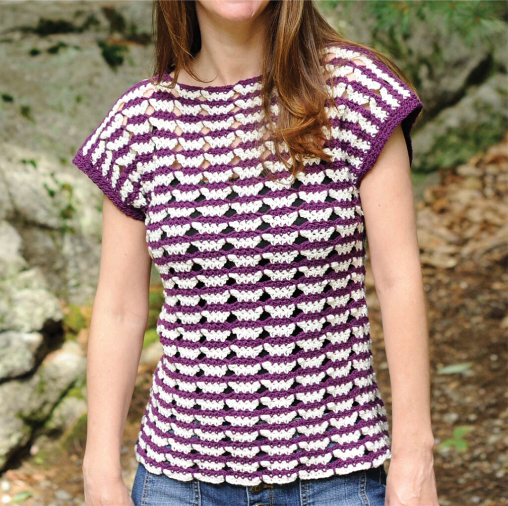 Mary Beth Cryan of Crochet with Mary Beth models her Butterfly Stripe Tee, a perfect modest crochet pattern to make and wear to the office.  The tee is made with the butterfly stitch in two tones.