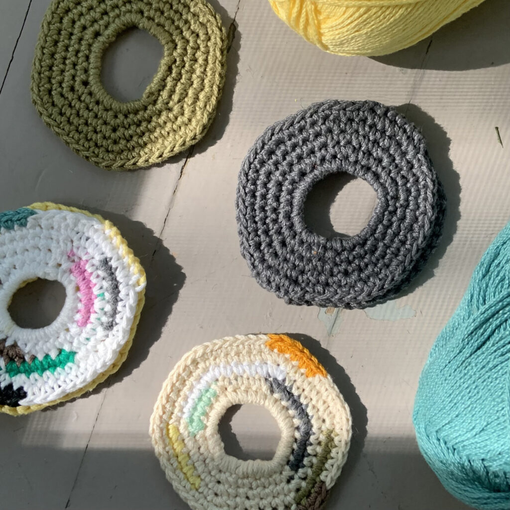 Four different color combinations that can be used with the Circle Around Crochet Jewelry Pattern.
