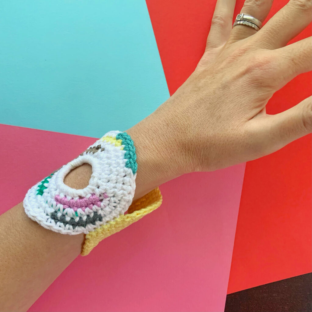 Are you looking for a quick crochet project? The Circle Around Bracelet takes less than 45 minutes and only 35 yards of scrap yarn. You'll have fun making and wearing this crochet bracelet. It will be a great addition to your crochet jewelry collection! Check out the pattern details.