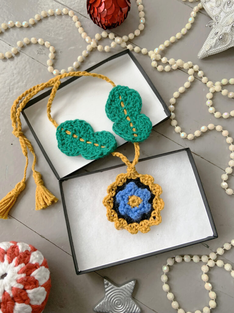 The crochet bundle includes the Once and Floral crochet necklace pictured here in a gift box.