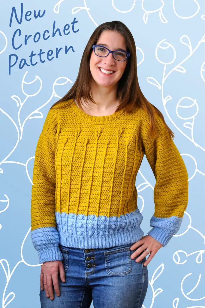 The Best Buds Crochet Sweater pattern is a fun and easy project.  The floral cable stitch works up quickly and is easy.  If you are looking for crochet clothes to add to your handmade wardrobe this is the perfect DIY project for you.  #crochetsweaterpattern