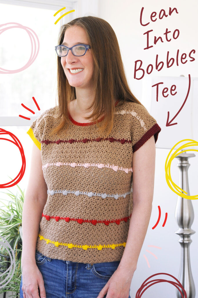 The Lean Into Bobbles Tee is fun diy crochet top for summer. I think you are really going to enjoy making and wearing crochet top pattern.  It's size inclusive and contains easy to follow instructions to customize the collar, sleeves, colors, and pattern.  This pin will take you straight to the crochet pullover.