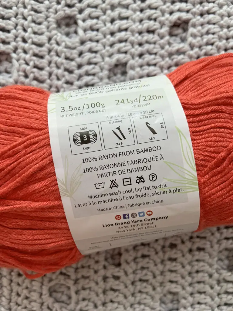 The fabric label from a skein of Lion Brand Truboo Yarn.